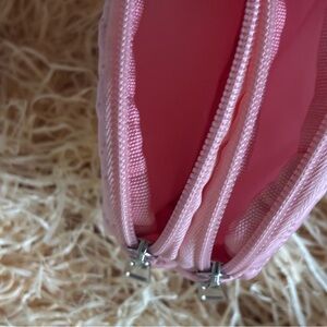 Diamond quilted double zippered nylon pouch aka treasure pouch.